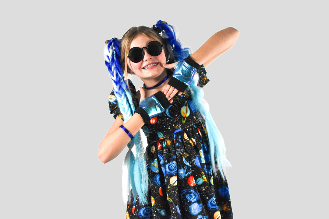 Young girl with colorful blue hair extension braids