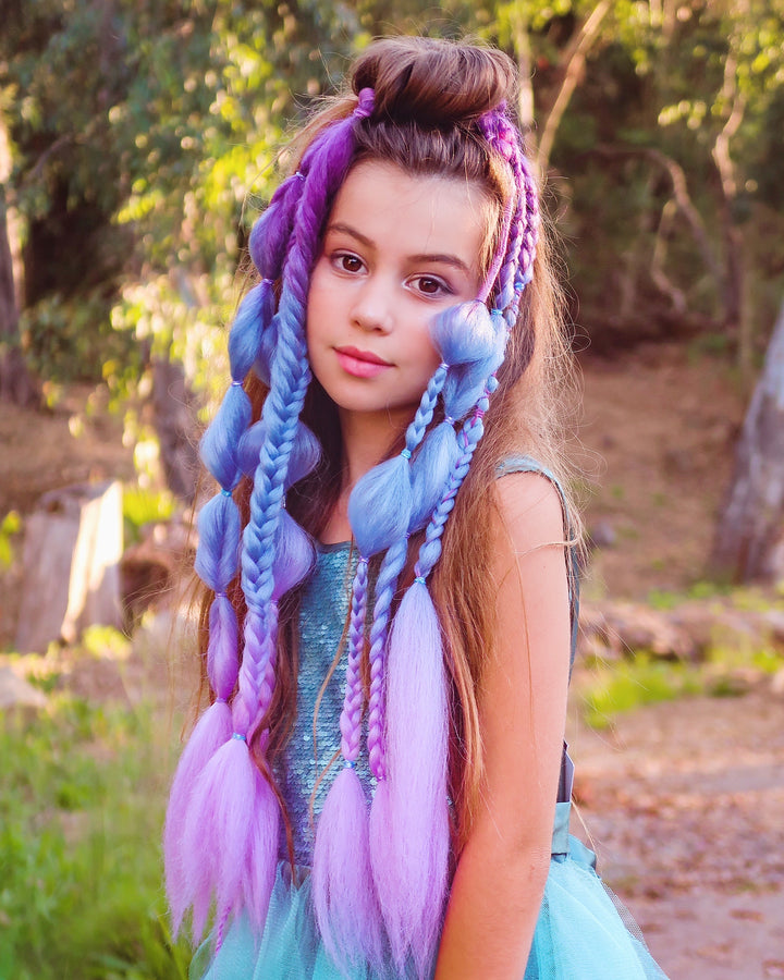 Model wears a set of Magic Clip-in Boho Braids