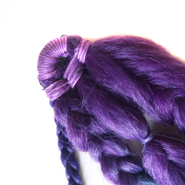Close-up detail of boho braid clip-in hair extensions