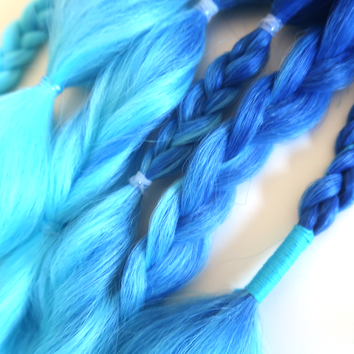 Detail of Neptune boho braids for festival hair
