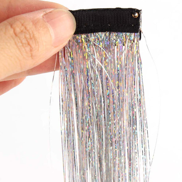 Close-up of holographic hair tinsel clip in extensions